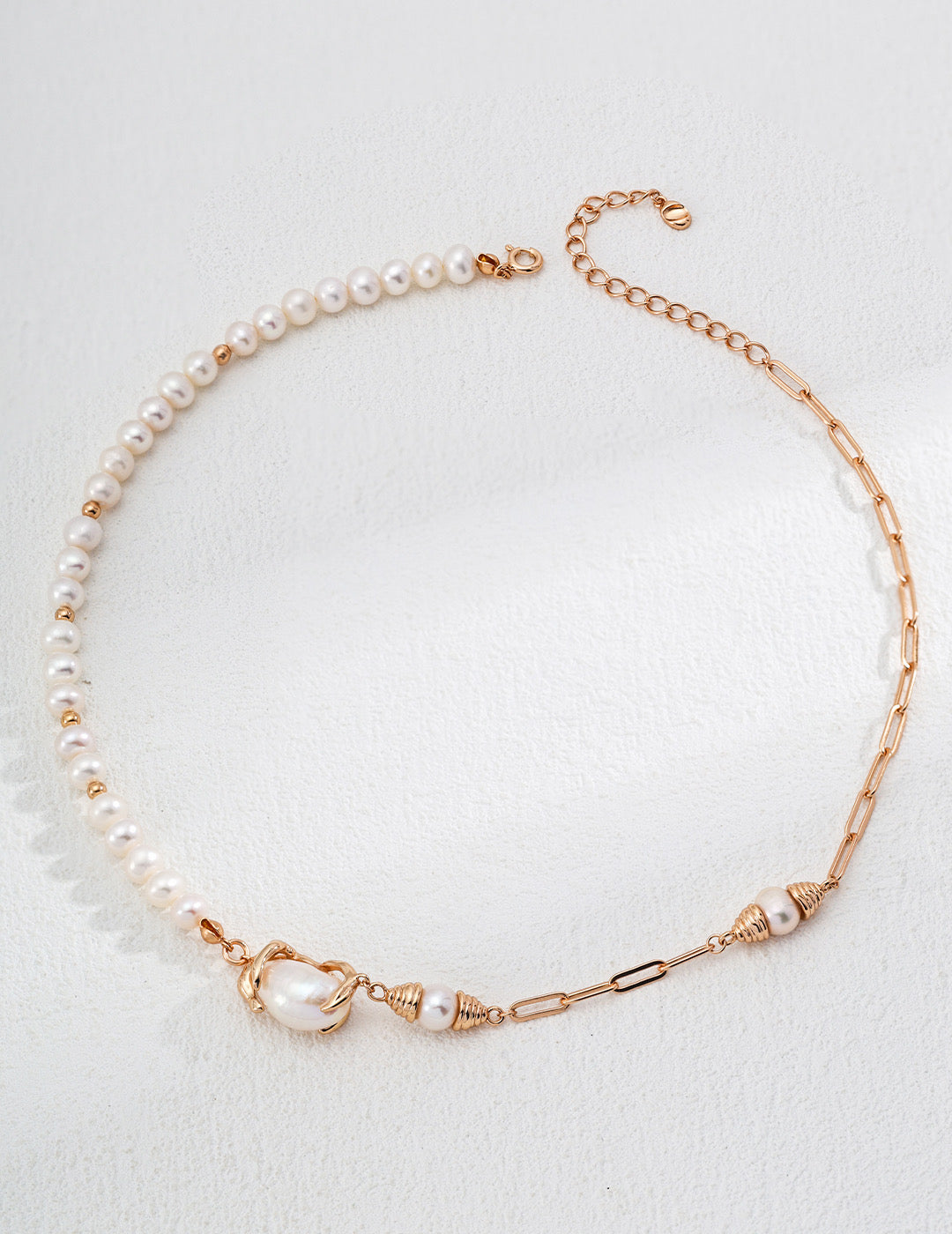 Asymmetric natural pearl necklace